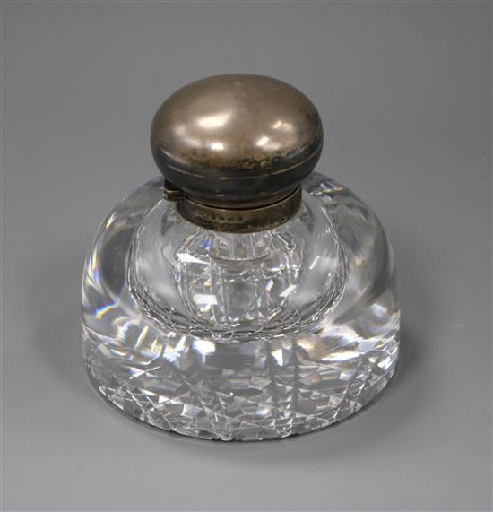 A Victorian silver mounted cut glass domed inkwell, John Grinsell & Sons, Birmingham, 1899, 12cm diameter of base.